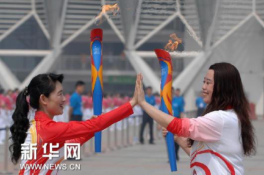 第三届亚沙会火炬在济南传递