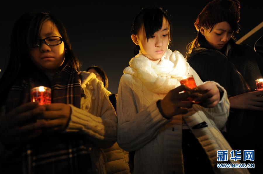 烛光纪念南京大屠杀75周年 老照片记录日本兽性