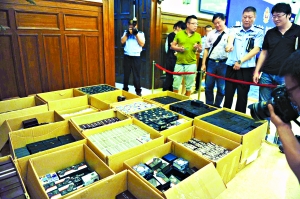 北京警方查扣3600多件偷拍器材 大量设备被外国人买走
