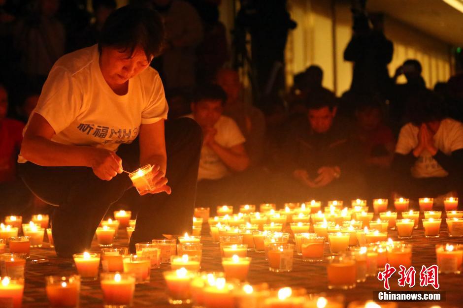 MH370航班失联满月 在京乘客家属举行祈福活动