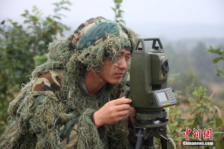 “火力-2014”演习 炮兵部队多种火炮实弹射击
