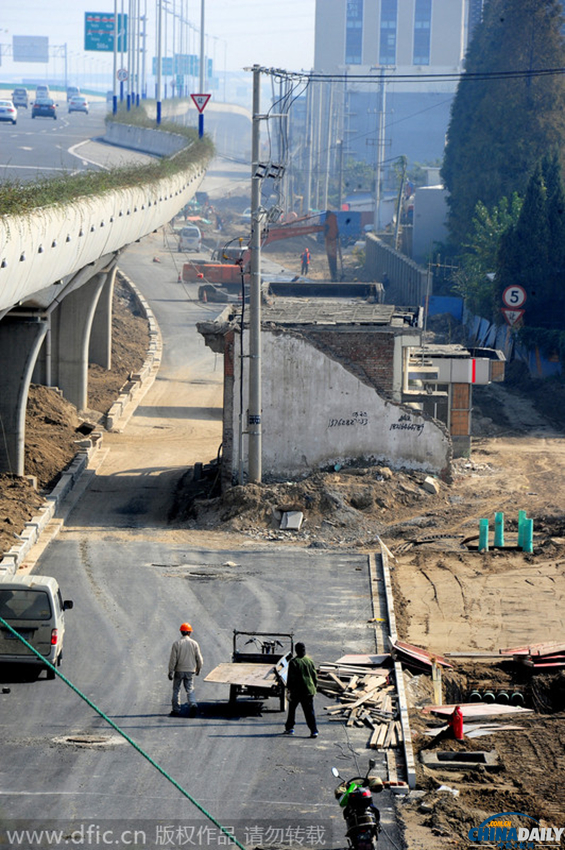 道路建设遭遇“拦路虎” 中储粮直属库成“钉子户”