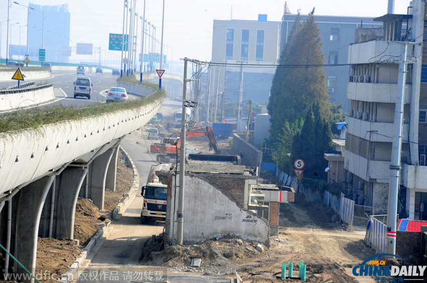 道路建设遭遇“拦路虎” 中储粮直属库成“钉子户”