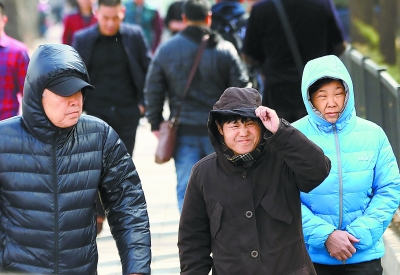 北京气温“上蹿下跳” 市民乱穿衣