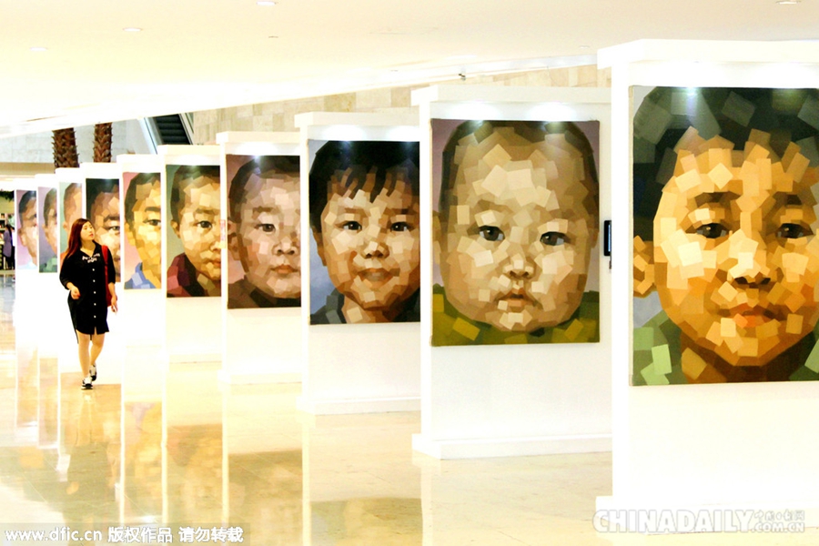 图片精选：61名走失儿童巨型油画肖像南京展出