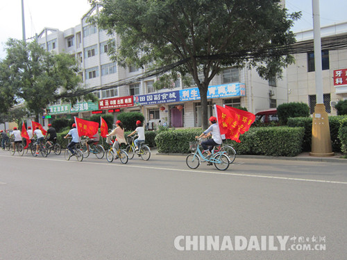 唐山乐亭城区举行青年志愿者绿色骑行活动