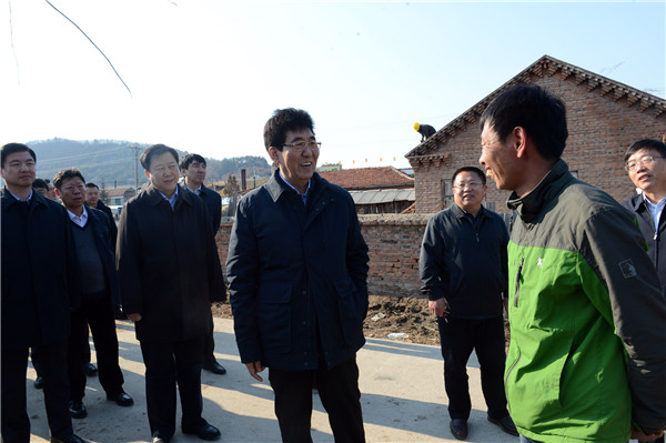 巴音朝鲁到延边州和龙市南坪镇高岭村调研