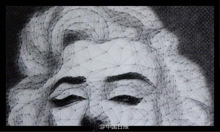 武汉大学生用9000颗钉子画出梦露