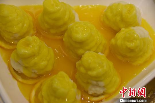 湖南新宁县推出“脐橙宴” 创意美食受追捧