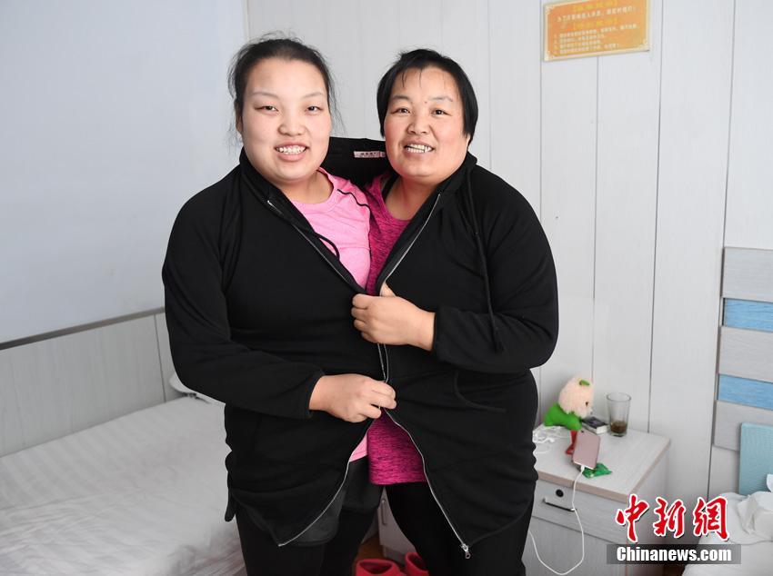 600斤母女瘦身268斤 重拾自信回家过年