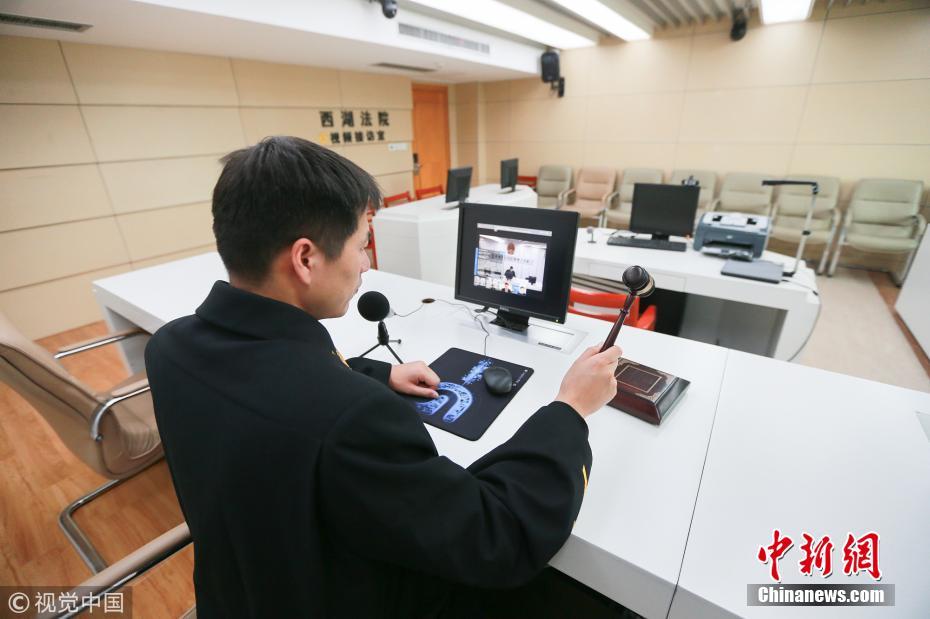 杭州现“一个人的法庭” 人工智能当书记员