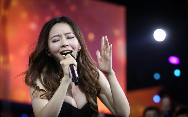 张靓颖的演唱 0024e83edef41909229748.jpeg