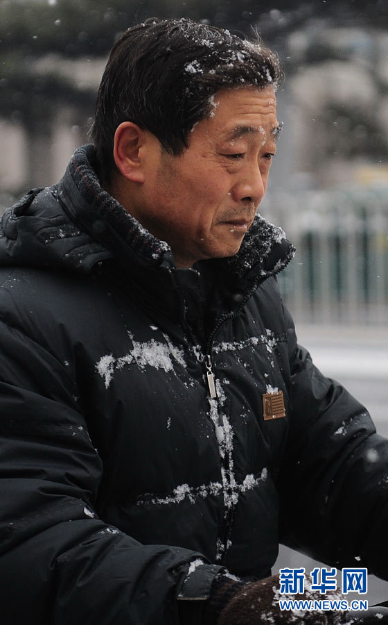 “雪花纷飞看京城”：北京大部地区迎来降雪