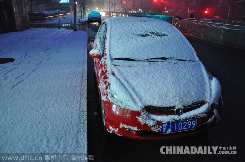 瑞雪兆丰年 北京降下羊年首场雪